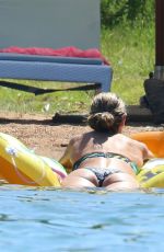 HEIDI KLUM in Bikini at a Beach in Corsica 07/25/2018