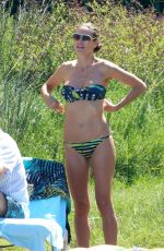 HEIDI KLUM in Bikini at a Beach in Corsica 07/25/2018