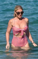 HOFIT GOLAN in Sswimsuit at club 55 in St Tropez 07/24/2018