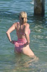 HOFIT GOLAN in Sswimsuit at club 55 in St Tropez 07/24/2018