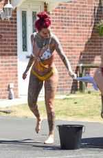 JEMMA LUCY and ALICIA SUMMERS in Bikinis Washing a Car in Manchester 07/05/2018