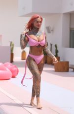 JEMMA LUCY in Pink Bikini at a Pool in Ibiza 07/20/2018
