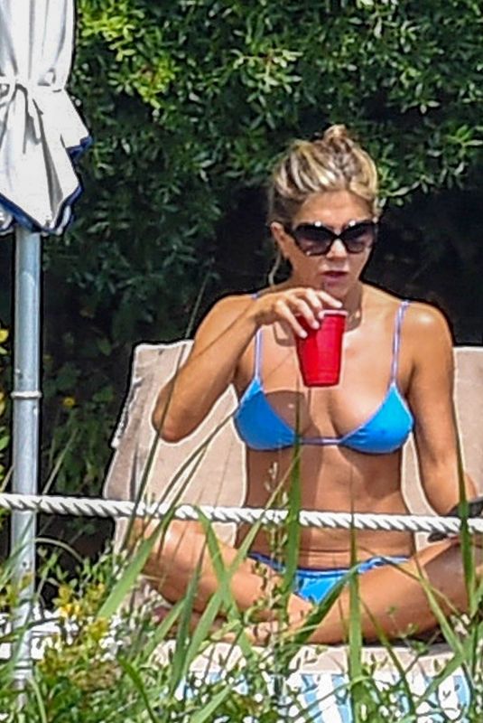 JENNIFER ANISTON in Bikini at a Pool in Portofino 07/22/2018