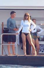 JENNIFER FLANVIN and SOPHIA, SISTINE and SCARLET STALLONE in Bikinis at a Yacht in Saint Tropez 07/10/2018