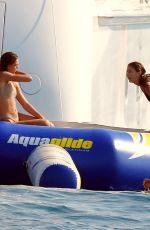 JENNIFER FLANVIN and SOPHIA, SISTINE and SCARLET STALLONE in Bikinis at a Yacht in Saint Tropez 07/10/2018