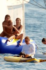 JENNIFER FLANVIN and SOPHIA, SISTINE and SCARLET STALLONE in Bikinis at a Yacht in Saint Tropez 07/10/2018
