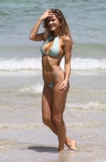 JOY CORRIGAN in Swimwear on the Beach in Miami 07/14/2018