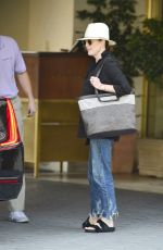JULIANNE MOORE Leaves Her Hotel in Los Angeles 07/19/2018