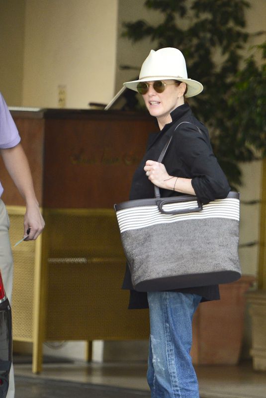 JULIANNE MOORE Leaves Her Hotel in Los Angeles 07/19/2018