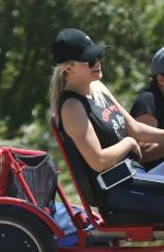 KALEY CUOCOC Riding a Trike Bike at a Park in Los Angeles 07/16/2018