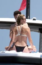KARLIE KLOSS in Bikini at a Boat in Capri 07/20/2018