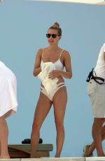 KARLIE KLOSS in Bikini at a Boat in Capri 07/20/2018
