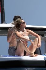 KARLIE KLOSS in Bikini at a Boat in Capri 07/20/2018