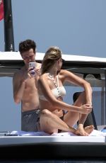 KARLIE KLOSS in Bikini at a Boat in Capri 07/20/2018