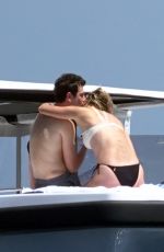 KARLIE KLOSS in Bikini at a Boat in Capri 07/20/2018