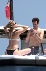 KARLIE KLOSS in Bikini at a Boat in Capri 07/20/2018