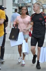 KATIE PRICE and Kris Boyson Shopping at Harvey Nichols and Selfridges in Manchester 07/28/2018