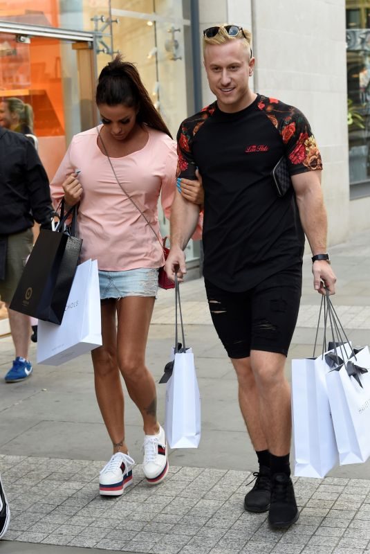 KATIE PRICE and Kris Boyson Shopping at Harvey Nichols and Selfridges in Manchester 07/28/2018