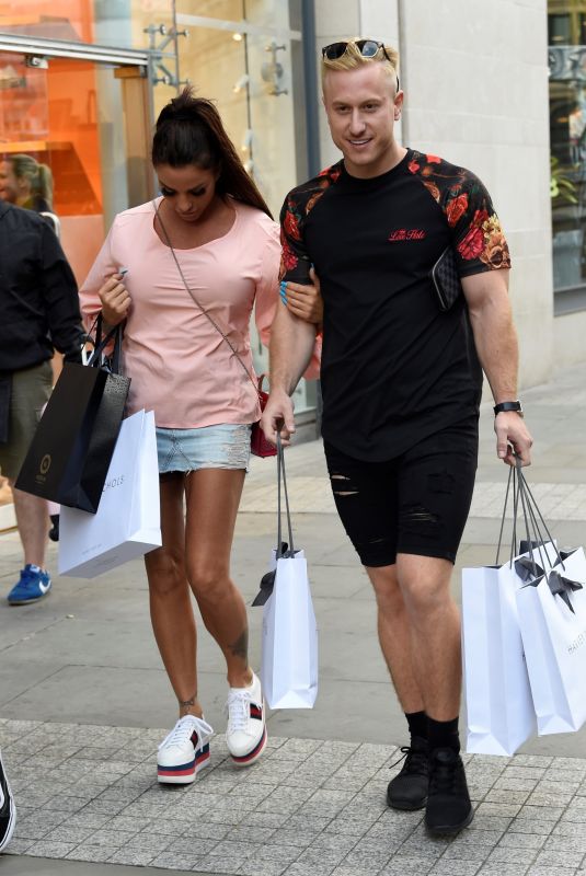 KATIE PRICE and Kris Boyson Shopping at Harvey Nichols and Selfridges in Manchester 07/28/2018