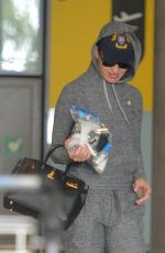 KATY PERRY at Heathrow Airport in London 07/12/2018