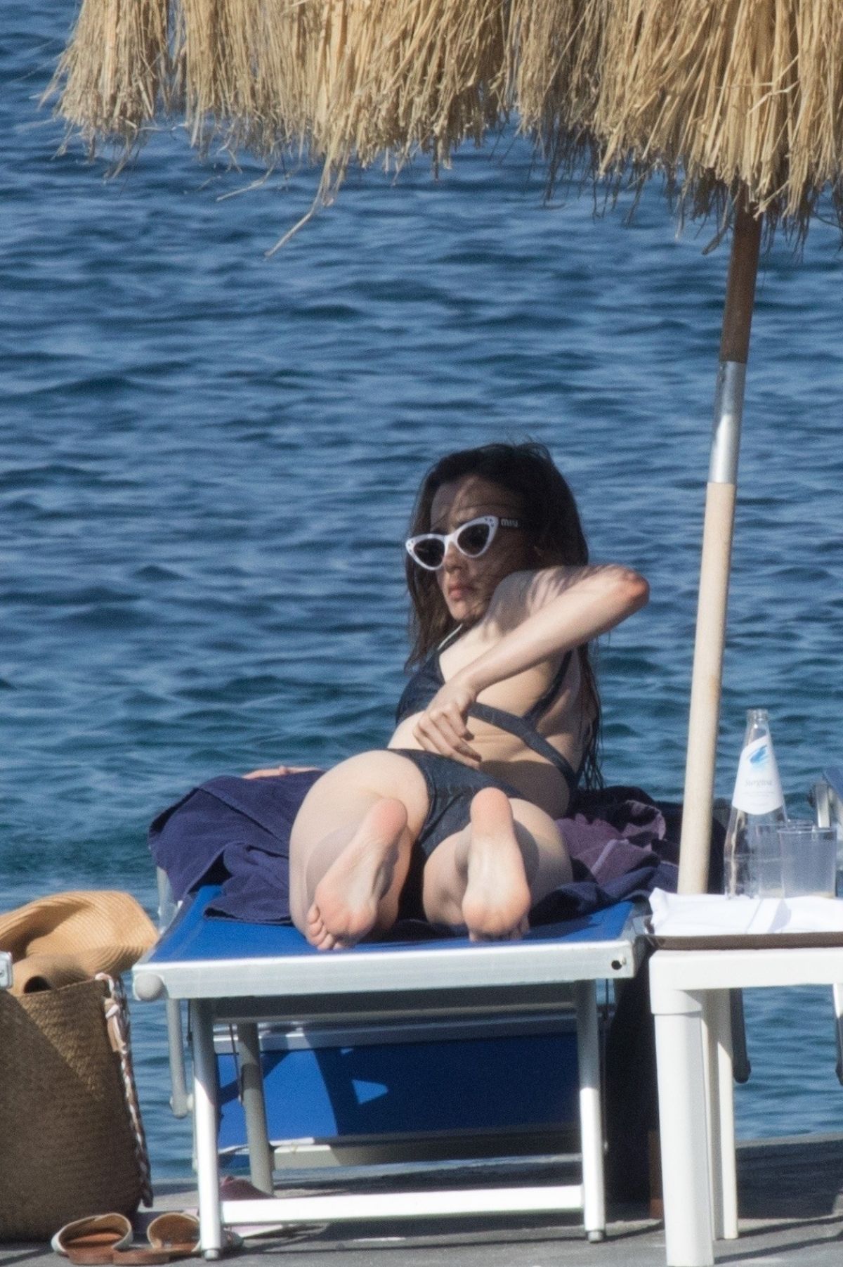 LILY COLLINS in Bikini at a Beach in Ischia 07/19/2018 - Haw