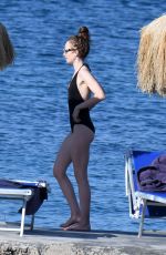 LILY COLLINS in Swimsuit at a Beach in Ischia 07/18/2018