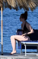 LILY COLLINS in Swimsuit at a Beach in Ischia 07/18/2018