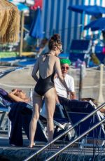 LILY COLLINS in Swimsuit at a Beach in Ischia 07/18/2018