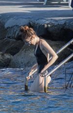 LILY COLLINS in Swimsuit at a Beach in Ischia 07/18/2018