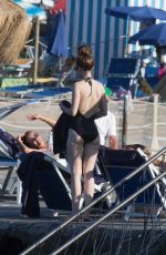 LILY COLLINS in Swimsuit at a Beach in Ischia 07/18/2018