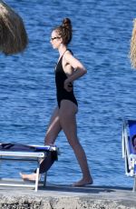 LILY COLLINS in Swimsuit at a Beach in Ischia 07/18/2018