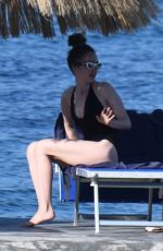 LILY COLLINS in Swimsuit at a Beach in Ischia 07/18/2018