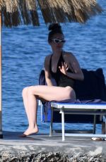 LILY COLLINS in Swimsuit at a Beach in Ischia 07/18/2018