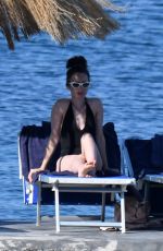 LILY COLLINS in Swimsuit at a Beach in Ischia 07/18/2018