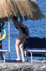 LILY COLLINS in Swimsuit at a Beach in Ischia 07/18/2018