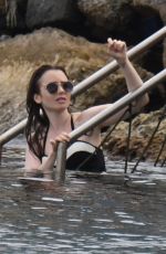 LILY COLLINS in Swimsuit at Hotel Isabella Hotel in Ischia 07/16/2018