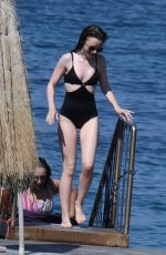 LILY COLLINS inSwimsuit at Hotel Regina Isabella in Ischia Porto 07/15/2018