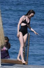 LILY COLLINS inSwimsuit at Hotel Regina Isabella in Ischia Porto 07/15/2018