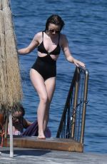 LILY COLLINS inSwimsuit at Hotel Regina Isabella in Ischia Porto 07/15/2018