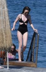 LILY COLLINS inSwimsuit at Hotel Regina Isabella in Ischia Porto 07/15/2018
