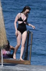 LILY COLLINS inSwimsuit at Hotel Regina Isabella in Ischia Porto 07/15/2018