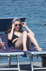 LILY COLLINS inSwimsuit at Hotel Regina Isabella in Ischia Porto 07/15/2018