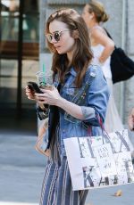 LILY COLLINS Out and About in Barcelona 07/12/2018