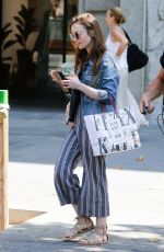 LILY COLLINS Out and About in Barcelona 07/12/2018
