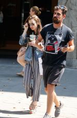 LILY COLLINS Out and About in Barcelona 07/12/2018