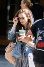 LILY COLLINS Out and About in Barcelona 07/12/2018