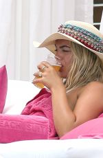 LOUISA JOHNSON in Bikini at a Pool in Ibiza 07/03/2018