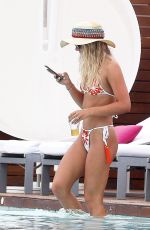 LOUISA JOHNSON in Bikini at a Pool in Ibiza 07/03/2018