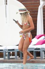 LOUISA JOHNSON in Bikini at a Pool in Ibiza 07/03/2018