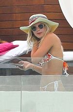 LOUISA JOHNSON in Bikini at a Pool in Ibiza 07/03/2018